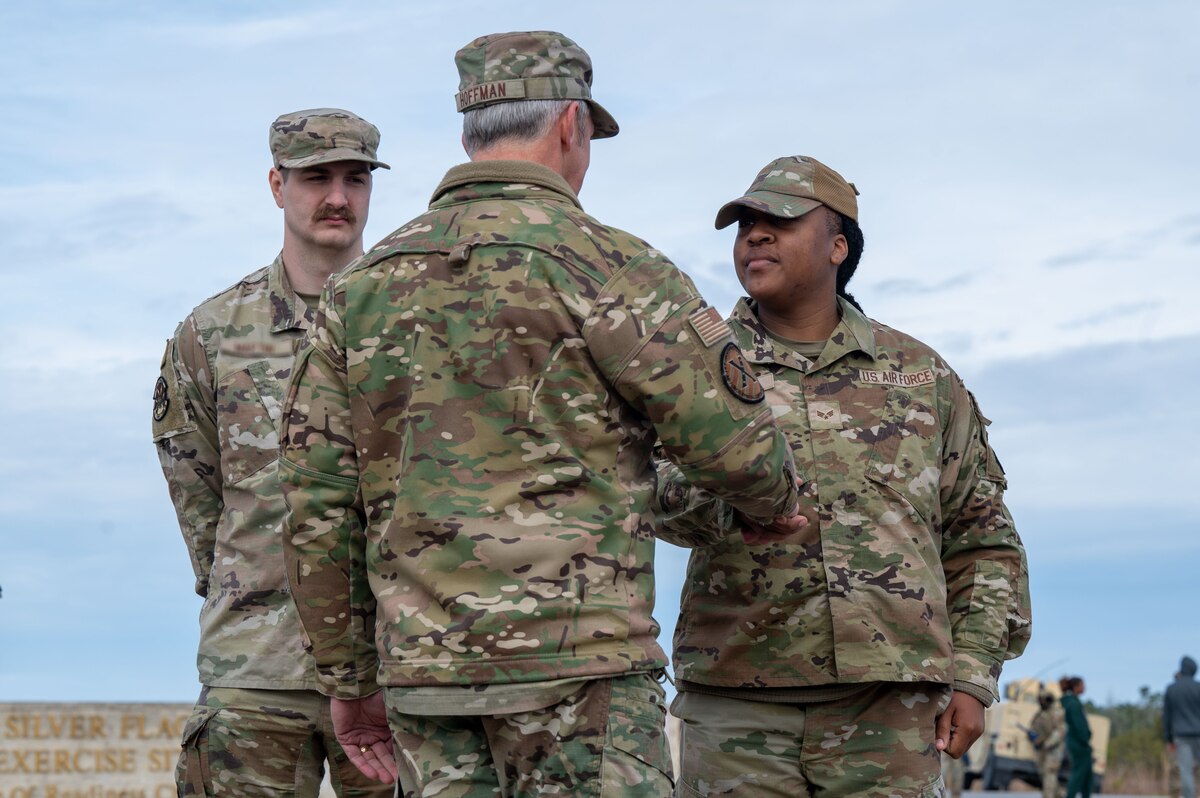 U.S. Air Force Maj. Gen. Justin Hoffman, Air Force Special Operations Command deputy commander, recognizes Airmen assigned to the 11th Air Task Force at Tyndall Air Force Base, Florida, Jan. 27, 2025. Airmen were recognized for their professionalism and work ethic. (U.S. Air Force photo by Senior Airman Jasmyne Bridgers-Matos)