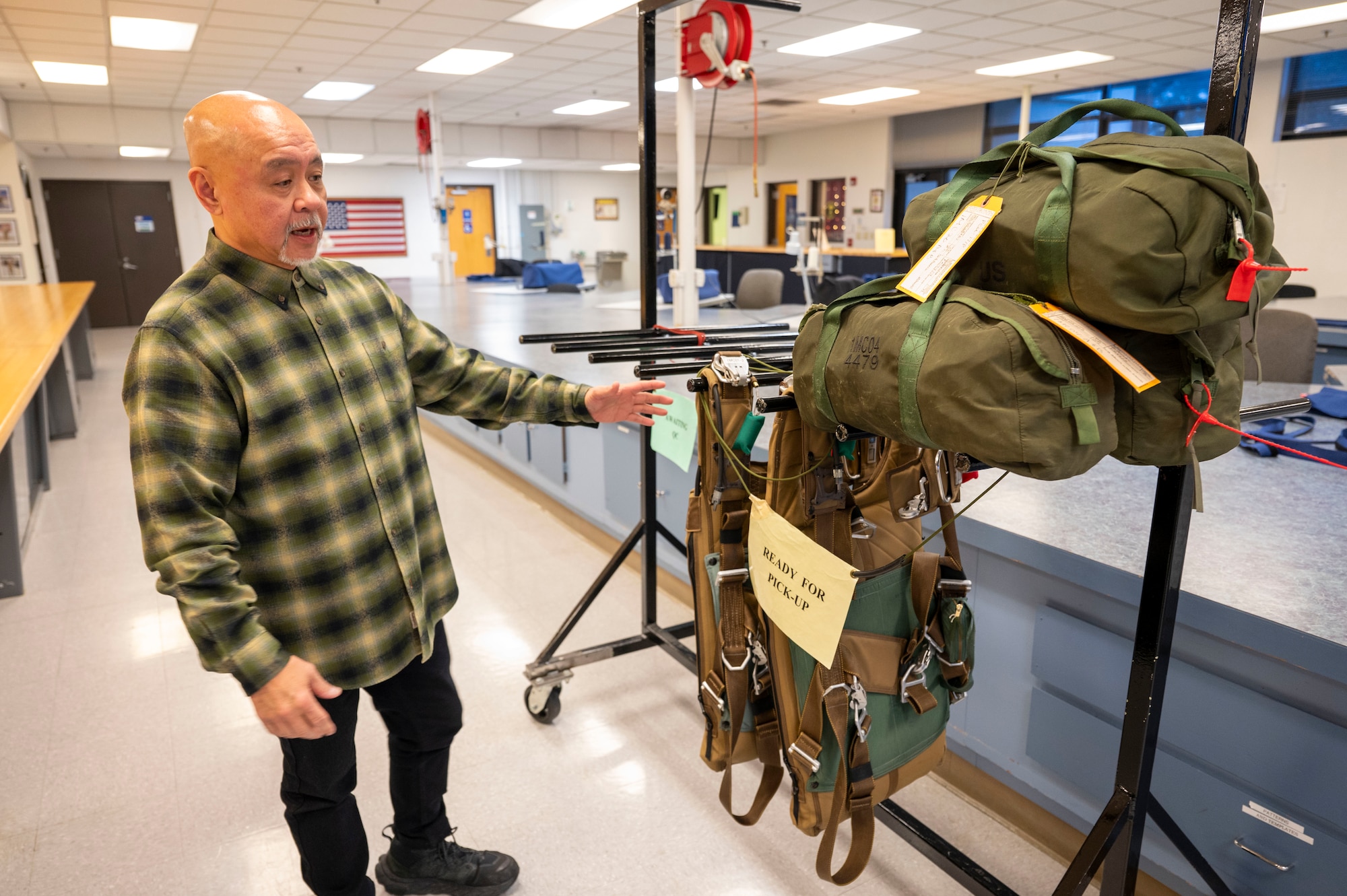 Cedrick Del Castillo, Aircrew Flight Equipment foreman with the 62d Operations Support Squadron, showcases his office at Joint Base Lewis-McChord, Washington, Jan. 13, 2025