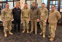 Members of the District of Columbia National Guard, attached to Joint Task Force-District of Columbia (JTF-DC), pose for a photo while providing communication support during the 60th Presidential Inauguration in Washington, D.C., Jan. 20, 2025. Approximately 8,000 National Guard service members from approximately 40 states, territories, and the District of Columbia comprise JTF-DC to support the 60th Presidential Inauguration, continuing a legacy that began in 1789 when their predecessors escorted George Washington to the first inauguration. At the request of civil authorities, these National Guard service members provide critical support such as crowd management, traffic control points, CBRN response, civil disturbance response, and sustainment operations. Their expertise and seamless collaboration with interagency partners help ensure a safe and peaceful transition of power during this historic event.