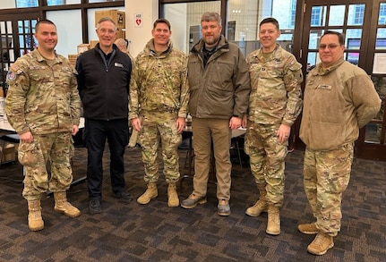 Members of the District of Columbia National Guard, attached to Joint Task Force-District of Columbia (JTF-DC), pose for a photo while providing communication support during the 60th Presidential Inauguration in Washington, D.C., Jan. 20, 2025. Approximately 8,000 National Guard service members from approximately 40 states, territories, and the District of Columbia comprise JTF-DC to support the 60th Presidential Inauguration, continuing a legacy that began in 1789 when their predecessors escorted George Washington to the first inauguration. At the request of civil authorities, these National Guard service members provide critical support such as crowd management, traffic control points, CBRN response, civil disturbance response, and sustainment operations. Their expertise and seamless collaboration with interagency partners help ensure a safe and peaceful transition of power during this historic event.