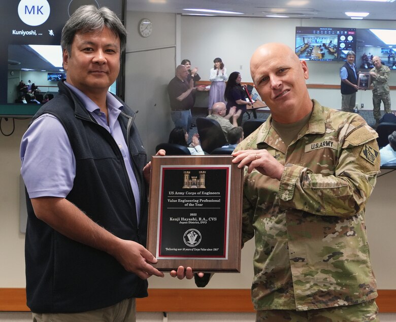U.S. Army Corps of Engineers – Japan Engineer District’s (USACE JED) Value Engineering Officer (VEO), Kenji Hayashi, accepts the USACE ‘Value Engineering Professional of the Year award’ from JED Commander, Col. Gary Bonham, June 1st, 2023. JED regularly has one of the largest overall military construction (MILCON) programs in USACE, and Kenji Hayashi manages all Value Engineering tasks for a wide range of projects for the Army, Navy, Air Force, Marine Corps, and Defense Logistics Agency (DLA).