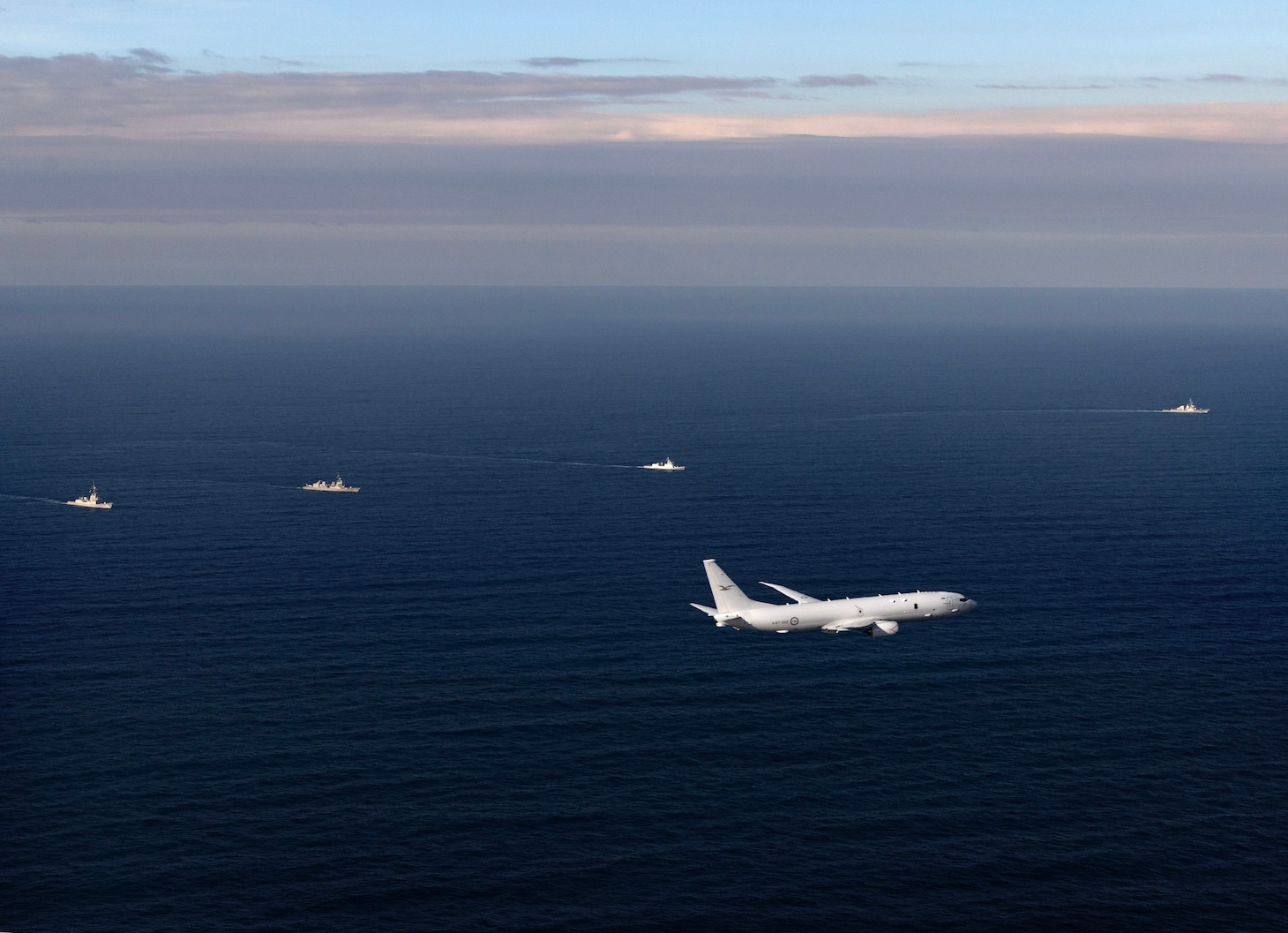 Royal Australian Air Force P-8A Poseidon during a Maritime Cooperative Activity consisting of Royal Australian Navy's HMAS Hobart, Japan Maritime Self-Defense Force ship Akizuki, Philippine Navy ship BRPJose Rizal, and United States Navy ship USS Benfold. *** Local Caption *** Naval and air force units from Australia, Japan, the Philippines and the United States, conducted a multilateral Maritime Cooperative Activity (MCA) within the Philippines� Exclusive Economic Zone on 5 February  2025.

Australia has participated in MCAs with the Philippines since 2023, underlining our commitment to strengthen regional and international cooperation in support of a peaceful, stable and prosperous Indo-Pacific.

Australia�s participation supports the right to freedom of navigation and overflight under international law, other lawful uses of the sea and international airspace, as reflected in the United Nations Convention on the Law of the Sea (UNCLOS).

Strong cooperation and the ability to work together, demonstrated through activities such this, enhance our interoperability and readiness to respond to shared security challenges with partners and allies. 

HMAS Hobart participated in the MCA during a six-week Regional Presence Deployment (RPD). RPDs in the Indo-Pacific demonstrate Australia�s commitment and ability to maintain a near continuous presence in the region to support regional security and stability.