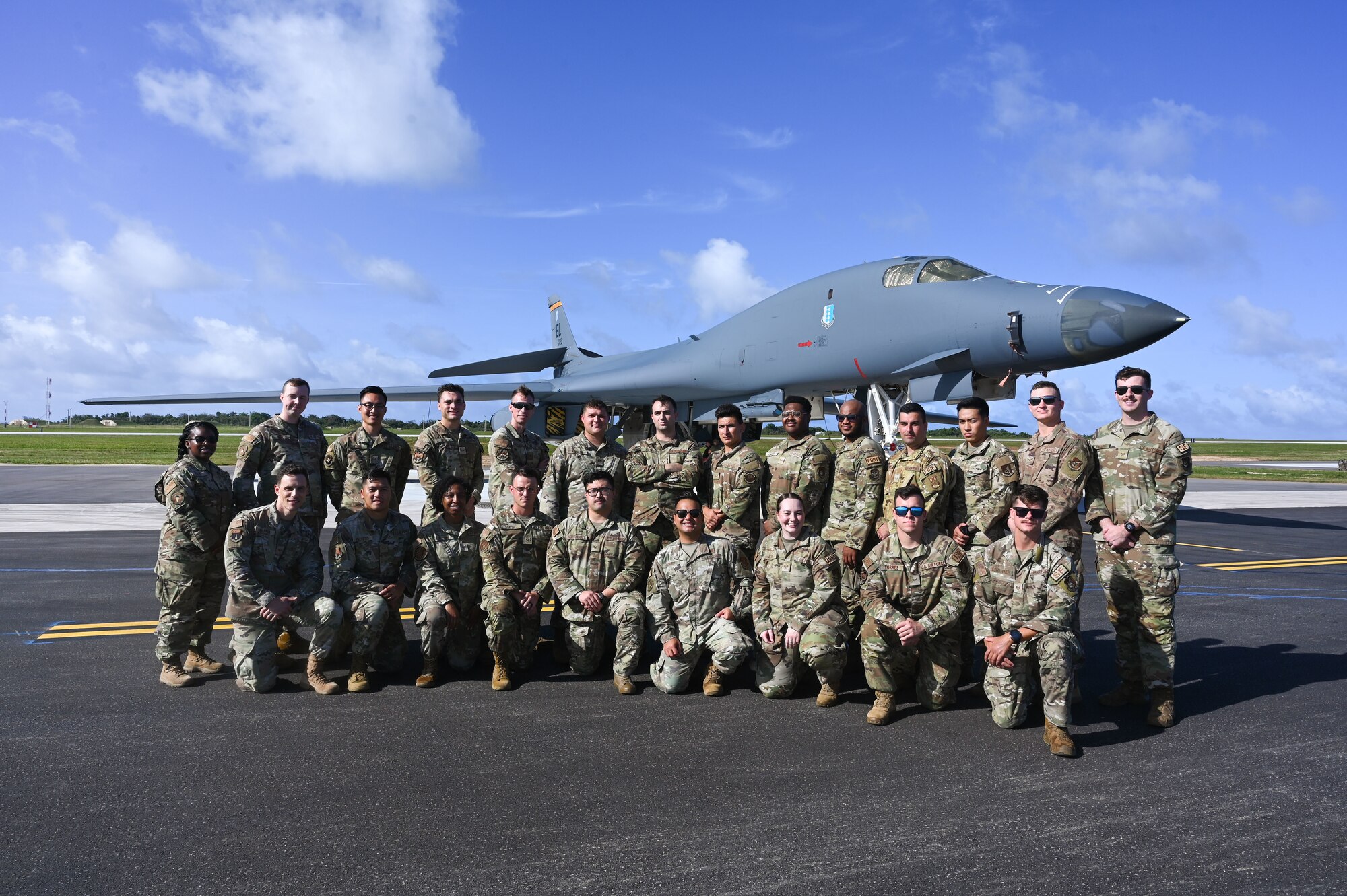 Airman Leadership School students, class 25-B, pose in front of a B-1 Lancer on Andersen Air Force Base, Guam, Jan. 31, 2025. The students received a tour of the B-1 Lancer as well as different 36th Operations Support Squadron facilities just two weeks before their expected graduation. (U.S. Air Force photo by Airman 1st Class Natasha Ninete).