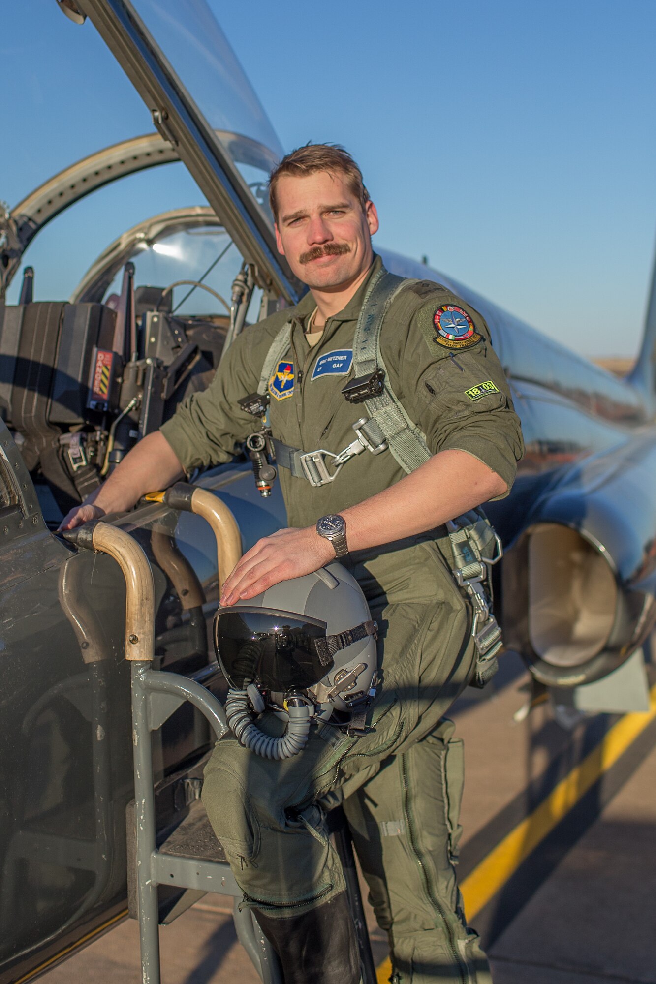 Capt. Eric Metzner climbs into a training aircraft at Sheppard Air Force Base, Texas.