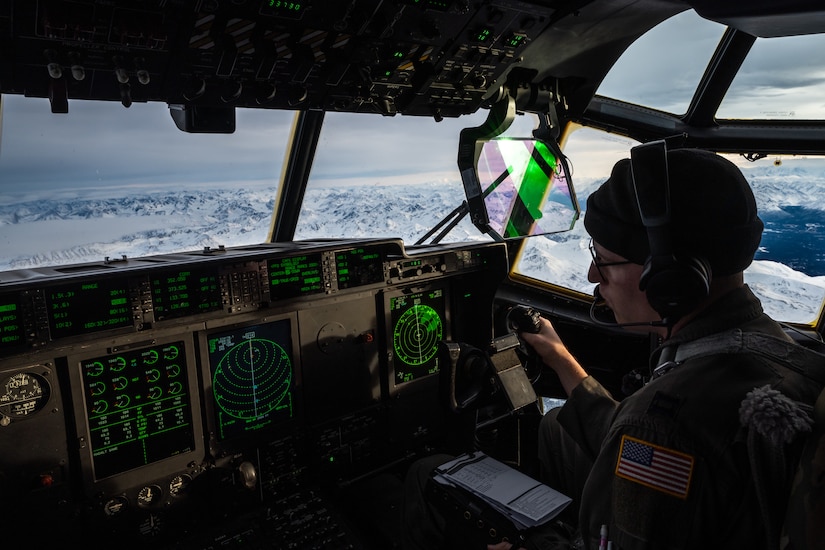 U.S. Air Force Capt. Austin Kintz, 40th Airlift Squadron pilot, flies a C-130J Super Hercules during the Joint Pacific Multinational Readiness Center 25-02 training exercise near Alaska Range, Alaska, Jan. 18, 2025. Kintz led 40th and 61st AS C-130s through low-altitude, mountainous terrain in the Joint Pacific Alaska Range Complex while evading simulated surface-to-air missiles in a combat training scenario. (U.S. Air Force photo by Airman 1st Class Jade M. Caldwell)