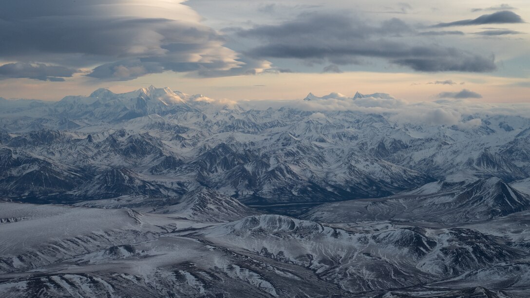 Mountains near Alaska Range, Alaska, Jan. 18, 2025. The 40th Airlift Squadron led a multi-element C-130J Super Hercules formation through Alaska Range at low-altitudes during the Joint Pacific Multinational Readiness Center 25-02 training exercise. JPMRC 25-02, conducted during Alaska’s coldest month, provided world-class training facilities and a harsh Arctic environment to build warriors capable of fighting anywhere in the world. (U.S. Air Force photo by Airman 1st Class Jade M. Caldwell)