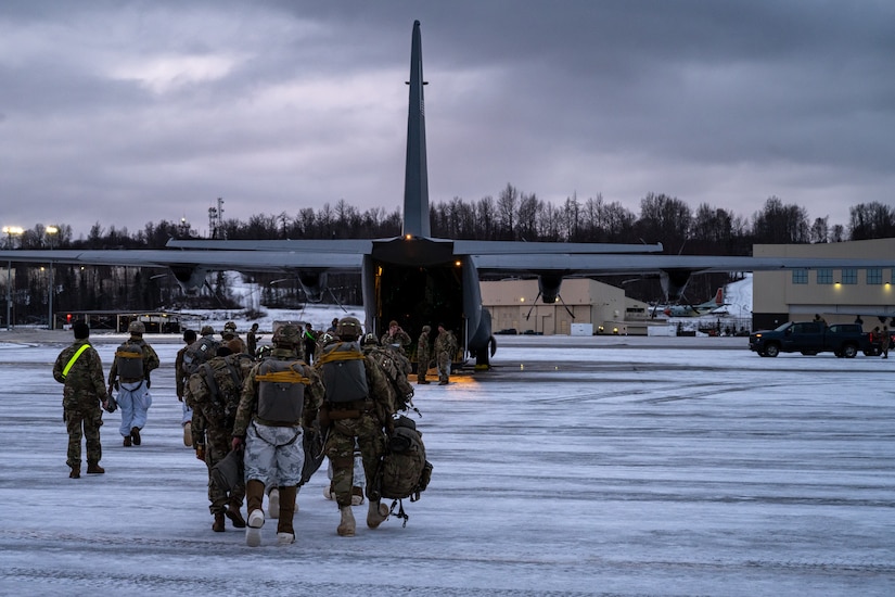 U.S. Soldiers from the 11th Airborne Division step to a C-130J Super Hercules during the Joint Pacific Multinational Readiness Center 25-02 training exercise at Joint Base Elmendorf-Richardson, Alaska, Jan. 22, 2025. JPMRC 25-02 was conducted during Alaska’s coldest month, allowing roughly 10,000 joint and multi-national service members to gain critical Arctic experience. (U.S. Air Force photo by Airman 1st Class Jade M. Caldwell)