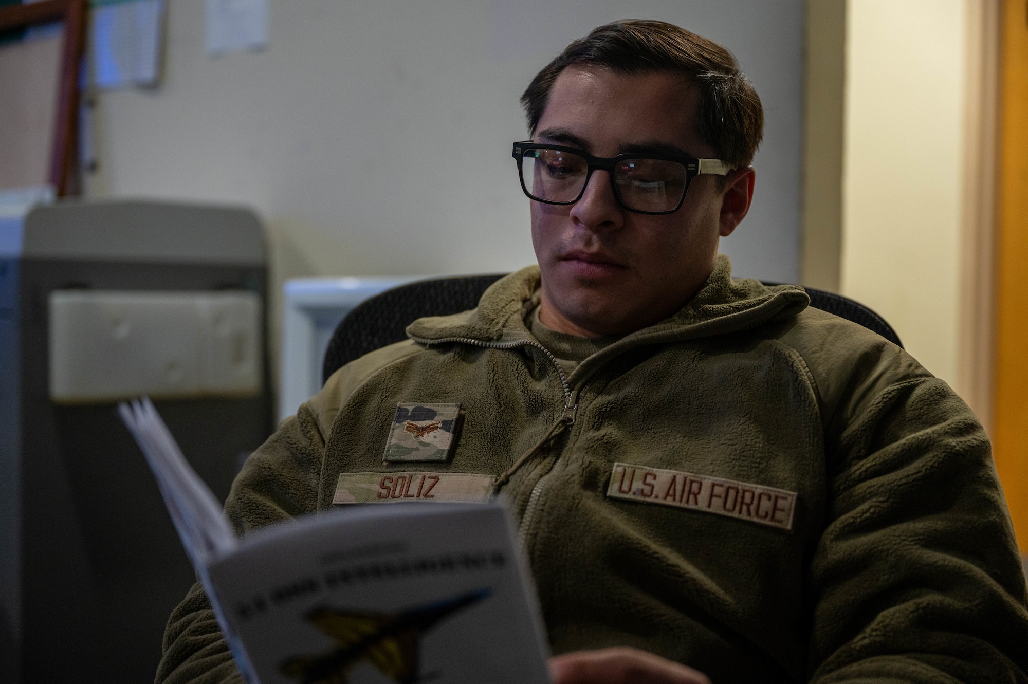 U.S. Air Force Senior Airman Cristian Soliz, 35th Operations Support Squadron Intelligence Formal Training Unit student, reviews an aircraft visual recognition study guide at Osan Air Base, Republic of Korea, Jan. 17, 2025. The course had intelligence students from Osan AB, Kunsan AB and Misawa AB. (U.S. Air Force photo by Staff Sgt. Christopher Tam)