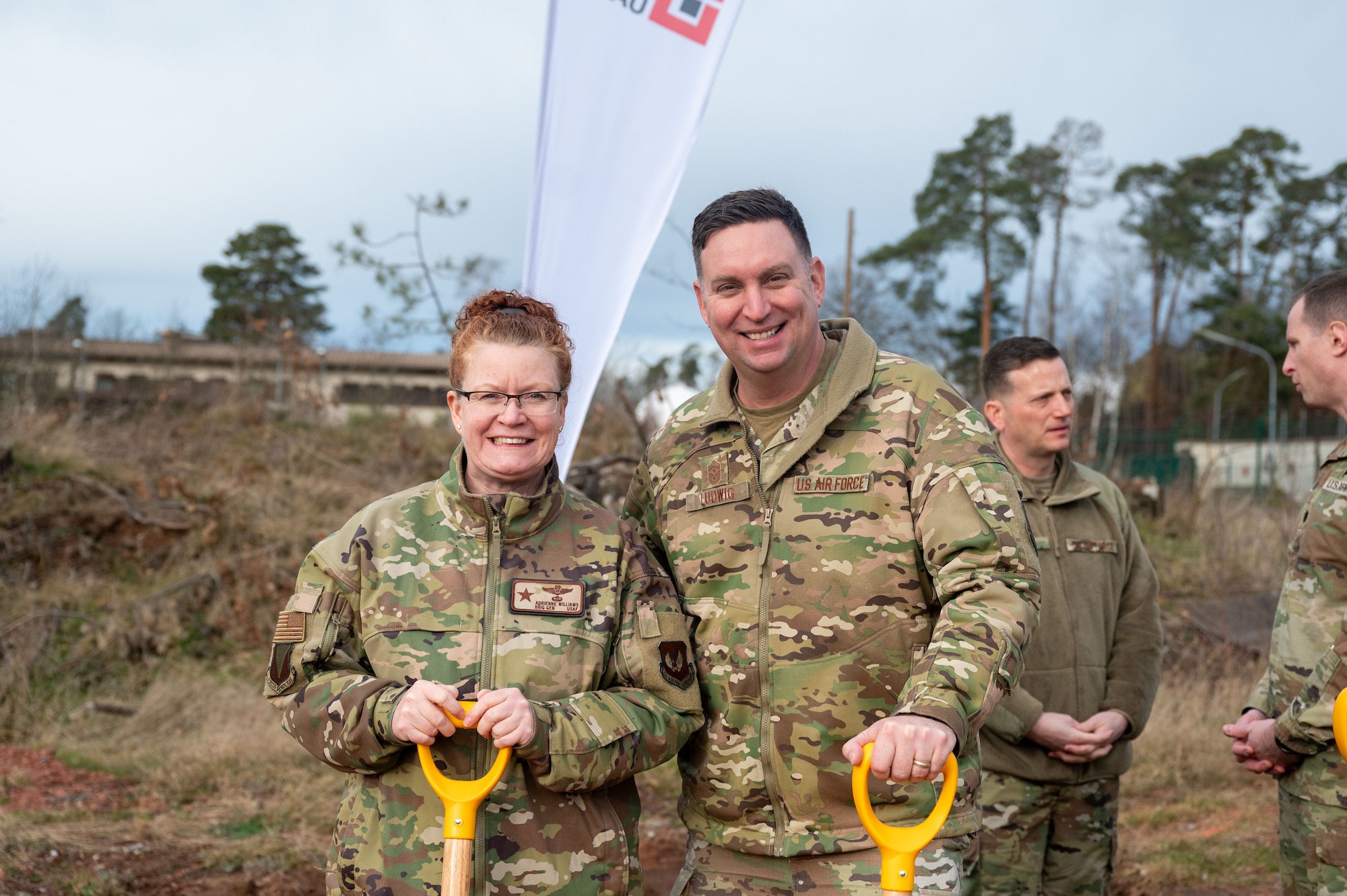 U.S. Air Force Brig. Gen. Adrienne L. Williams, 86th Airlift Wing commander, and U.S. Air Force Chief Master Sgt. Louis Ludwig, 86th AW command chief, pose for a photo