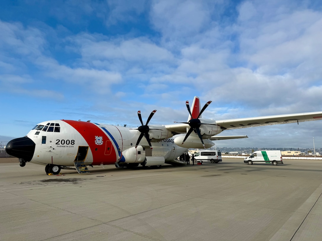 A U.S. Coast Guard C-130 Hercules crew prepares for an alien expulsion flight in San Diego, California, Feb. 5, 2025.