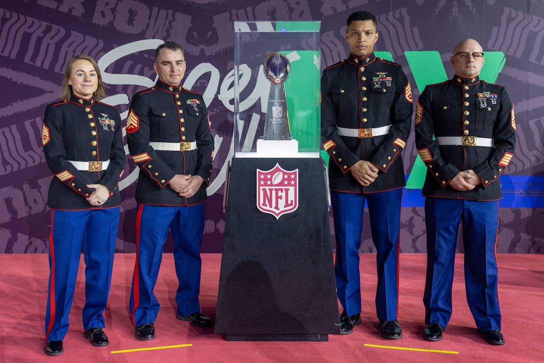 U.S. Marines pose for a photo during the NFL’s Super Bowl Fan Zone Experience at the Ernest N. Morial Convention Center, New Orleans, Feb. 5, 2025. Marines from Marine Medium Tiltrotor Squadron (VMM) 774 and 764, 4th Marine Aircraft Wing, Marine Forces Reserve, participated in the experience, giving them the opportunity to interact with the American public, increase knowledge about the Marine Corps Reserve and kickoff the celebration of the U.S. Marine Corps’ 250th birthday. (U.S. Marine Corps Photo by Lance Cpl. Juan Diaz)