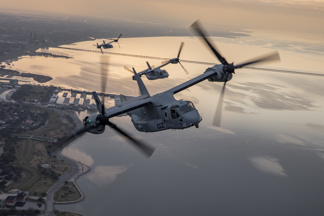 U.S. Marine Corps MV-22 Ospreys, tiltrotor aircraft, with Marine Medium Tiltrotor Squadron (VMM) 774, Marine Aircraft Group 49, 4th Marine Aircraft Wing and VMM-764, Marine Aircraft Group 41, 4th Marine Aircraft Wing, perform a formation flight over New Orleans, Feb. 4, 2025. MV-22 Osprey pilots and flight crew with VMM-744, Marine Aircraft Group 49, 4th Marine Aircraft Wing and VMM-764, Marine Aircraft Group 41, 4th Marine Aircraft Wing conducted a flight rehearsal in preparation for the flyover during Super Bowl LIX. (U.S. Marine Corps photo by Lance Cpl. Van Hoang)