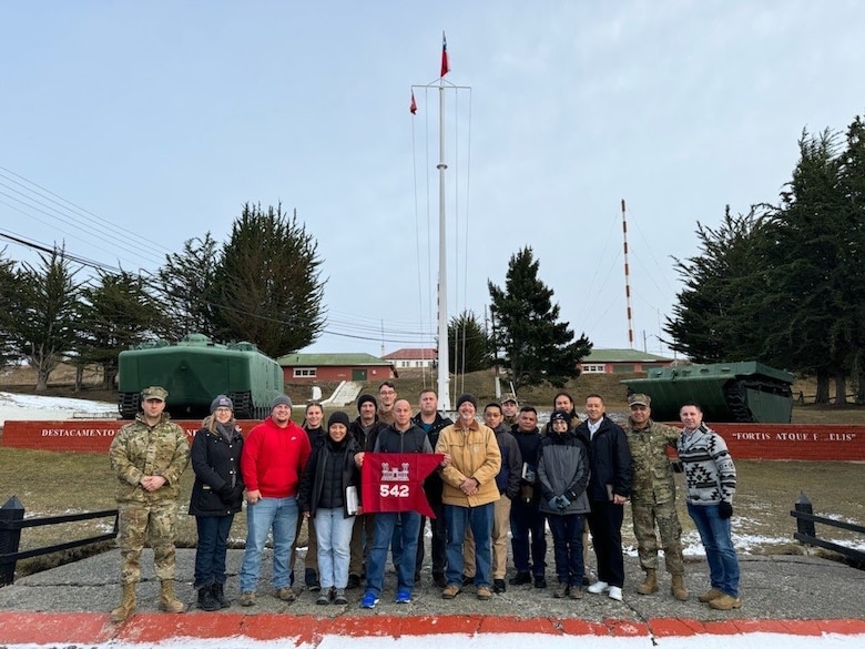 The 542nd Forward Engineer Support Team—Advanced, pose with the team guidon during their Field Force Engineering Certification Exercise, July 26, 2024, in Punta Arenas, Chile. The team participated in the exercise in preparation for a future deployment to the Philippines.