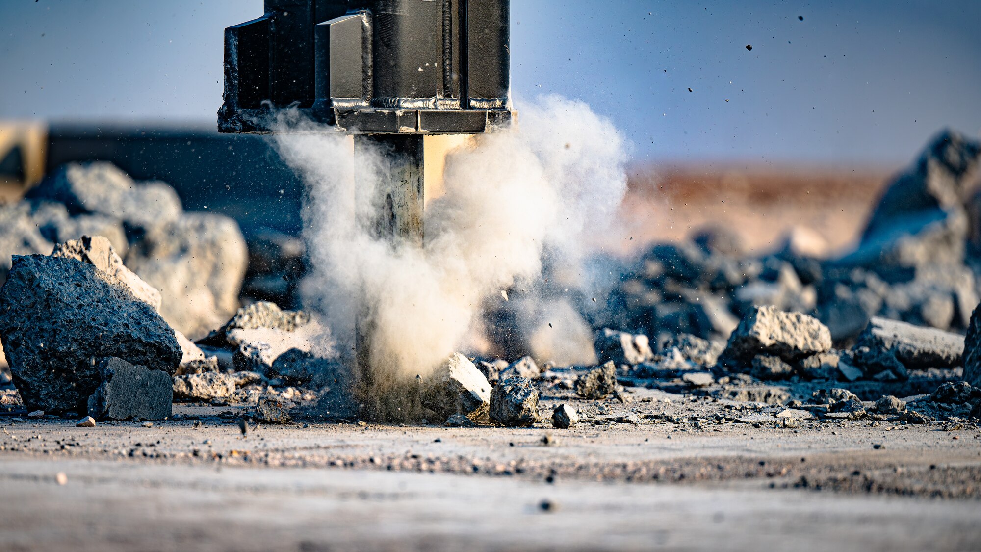 Excavator drills into training pad