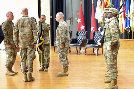 U.S. Army Maj. Gen. Kelly Dickerson, Commanding General of the 84th Training Commend, holds the colors at a change of command ceremony, January 31, 2025, at Fort Knox, Ky.