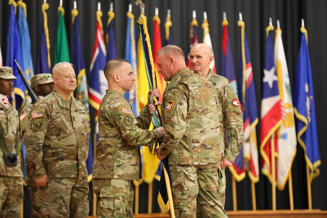 U.S. Army Lt. Gen. Robert Harter, Commanding General, United States Army Reserve, passes the colors to Maj. Gen. Kelly Dickerson, Commanding General, 84th Training Command at a change of command ceremony, January 31, 2025.