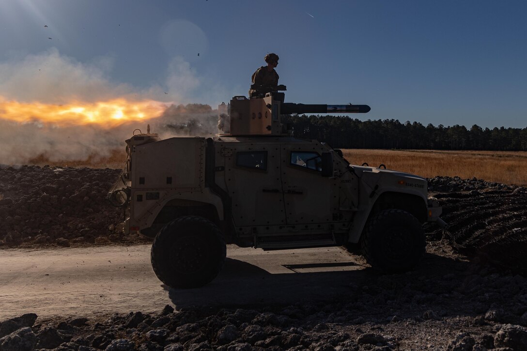 U.S. Marines with Weapons Company, Battalion Landing Team 3rd Battalion, 6th Marine Regiment, 22nd Marine Expeditionary Unit, fire a tube-launched optically-tracked wireless-guided (TOW) weapon system during Marine Expeditionary Unit Exercise at range SR-7 on Marine Corps Base Camp Lejeune, North Carolina on Jan. 17, 2025. MEUEX is the 22nd MEU's first large-scale exercise as a composited Marine Air-Ground Task Force, focusing on split operations with consolidated command and control to enhance readiness for its upcoming deployment. (U.S. Marine Corps photo by Cpl. Emily Hazelbaker)