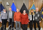 Retirees pose with their spouses after being recognized during the Defense Logistics Agency Troop Support's Civilian Retirement Ceremony Jan. 30.