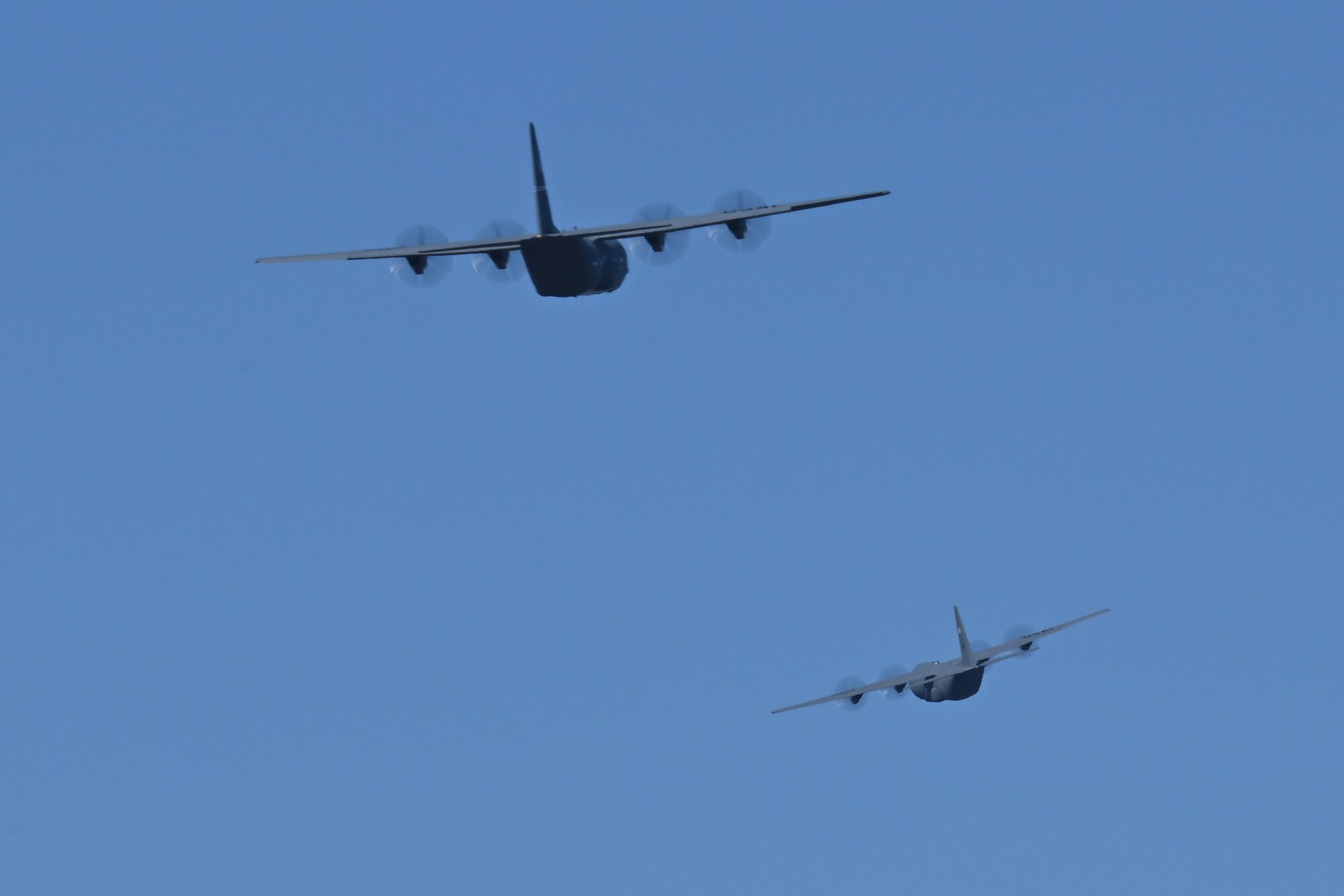 A pair of C-130J-30 Super Hercules aircraft fly away for a two-aircraft formation flight at Youngstown Air Reserve Station, Ohio, Feb. 4, 2025.