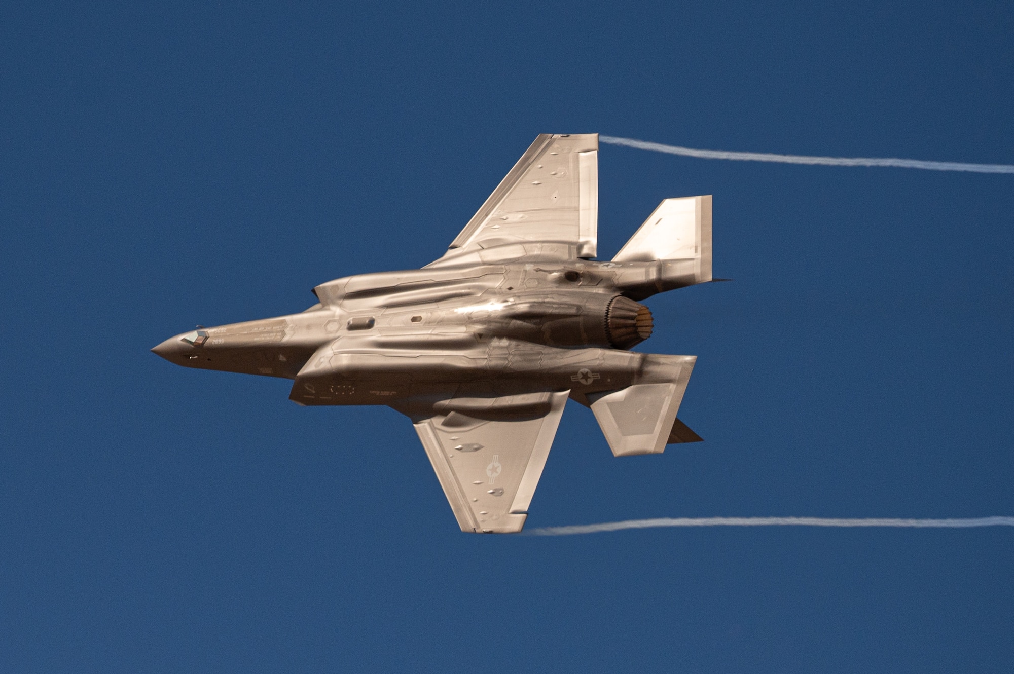 A photo of an F-35 flying