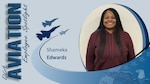 profile photo of Shameka Edwards standing in front of a beige wall