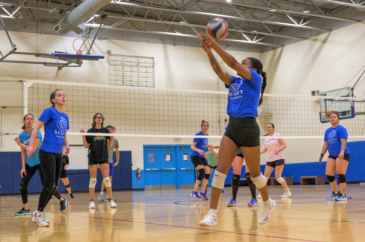 Woman passing volleyball.
