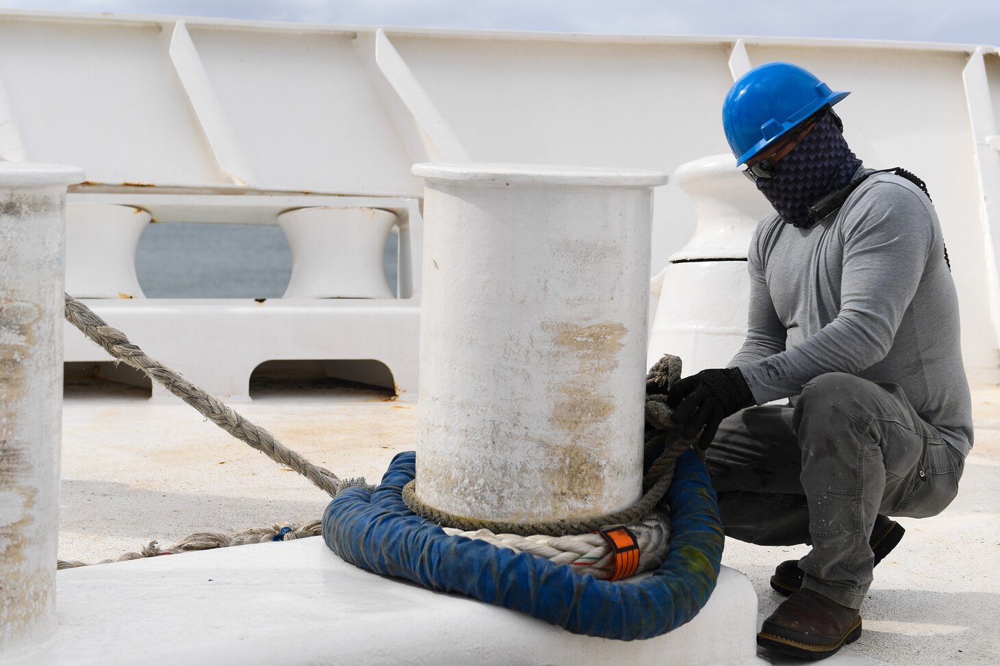 Military Sealift Command Civil Service Mariner Alvin White secures line aboard the hospital ship USNS Mercy (T-AH 19) while departing Joint Base Pearl Harbor-Hickam, Hawaii, as part of Pacific Partnership 2024-1, Feb. 4, 2024. Pacific Partnership, now in its 19th iteration, is the largest multinational humanitarian assistance and disaster relief preparedness mission conducted in the Indo-Pacific and works to enhance regional interoperability and disaster response capabilities, increase security stability in the region, and foster new and enduring friendships