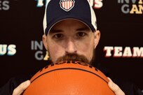 Retired Navy Master Chief Steven Flemming, getting ready for wheelchair basketball practice with teammates during the 2025 Team U.S. Invictus Games Training Camp located at Joint Base Lewis-McChord (JBLM)