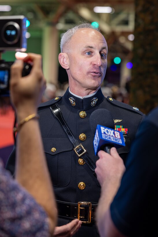 U.S. Marine Corps Lt. Col Sean Houlsey, commanding officer, Marine Medium Tiltrotor Squadron (VMM) 764, 4th Marine Aircraft Wing, is interviewed during the NFL’s Super Bowl Fan Zone Experience at the Ernest N. Morial Convention Center, New Orleans, Feb. 5, 2025. Marines from Marine Medium Tiltrotor Squadron (VMM) 774 and 764 participated in the experience, giving them the opportunity to interact with the American public, increase knowledge about the Marine Corps Reserve and kickoff the celebration of the U.S. Marine Corps’ 250th birthday. (U.S. Marine Corps Photo by Lance Cpl. Juan Diaz)