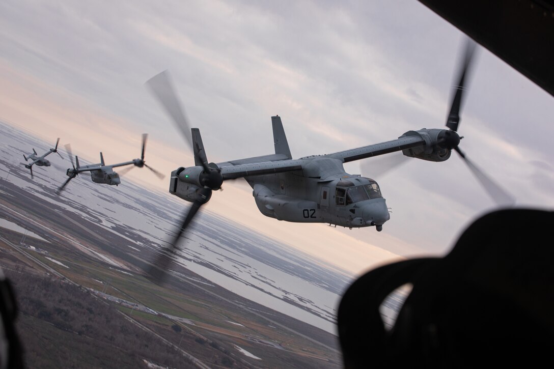 U.S. Marine Corps MV-22 Ospreys, tiltrotor aircraft, with Marine Medium Tiltrotor Squadron (VMM) 774, Marine Aircraft Group 49, 4th Marine Aircraft Wing and VMM-764, Marine Aircraft Group 41, 4th Marine Aircraft Wing, perform a formation flight over New Orleans, Feb. 4, 2025. MV-22 Osprey pilots and flight crew with VMM-744, Marine Aircraft Group 49, 4th Marine Aircraft Wing and VMM-764, Marine Aircraft Group 41, 4th Marine Aircraft Wing conducted a flight rehearsal in preparation for the flyover during Super Bowl LIX. (U.S. Marine Corps photo by Lance Cpl. Van Hoang)