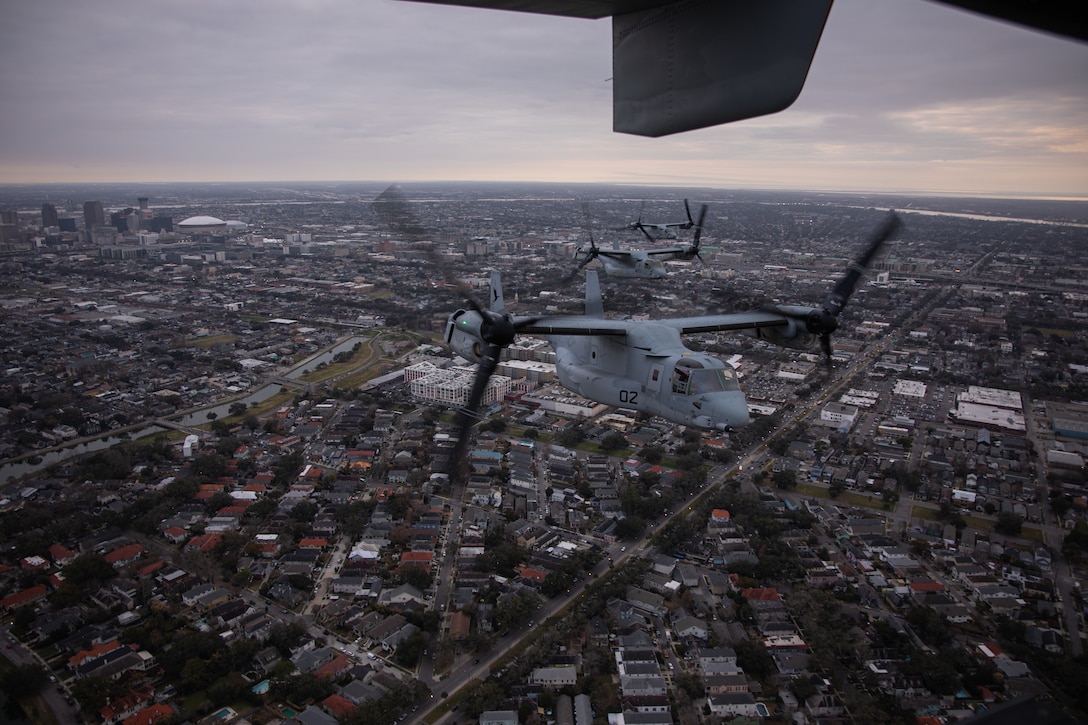 U.S. Marine Corps MV-22 Ospreys, tiltrotor aircraft, with Marine Medium Tiltrotor Squadron (VMM) 774, Marine Aircraft Group 49, 4th Marine Aircraft Wing and VMM-764, Marine Aircraft Group 41, 4th Marine Aircraft Wing, perform a formation flight over New Orleans, Feb. 4, 2025. MV-22 Osprey pilots and flight crew with VMM-744, Marine Aircraft Group 49, 4th Marine Aircraft Wing and VMM-764, Marine Aircraft Group 41, 4th Marine Aircraft Wing conducted a flight rehearsal in preparation for the flyover during Super Bowl LIX. (U.S. Marine Corps photo by Lance Cpl. Van Hoang)