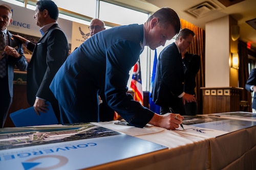 U.S. Air Force Col. Dustin Richards, 88th Air Base Wing and Installation commander, joins local government officials celebrating the announcement of the Enhanced Use Lease Agreement Feb. 3, 2025, in Beavercreek, Ohio.