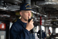 Ensign Neil Stegman, a crewmember aboard U.S. Coast Guard Cutter Polar Star (WAGB 10), breaks in as the underway officer of the day while the cutter transits the Southern Ocean on its way to Antarctica for Operation Deep Freeze