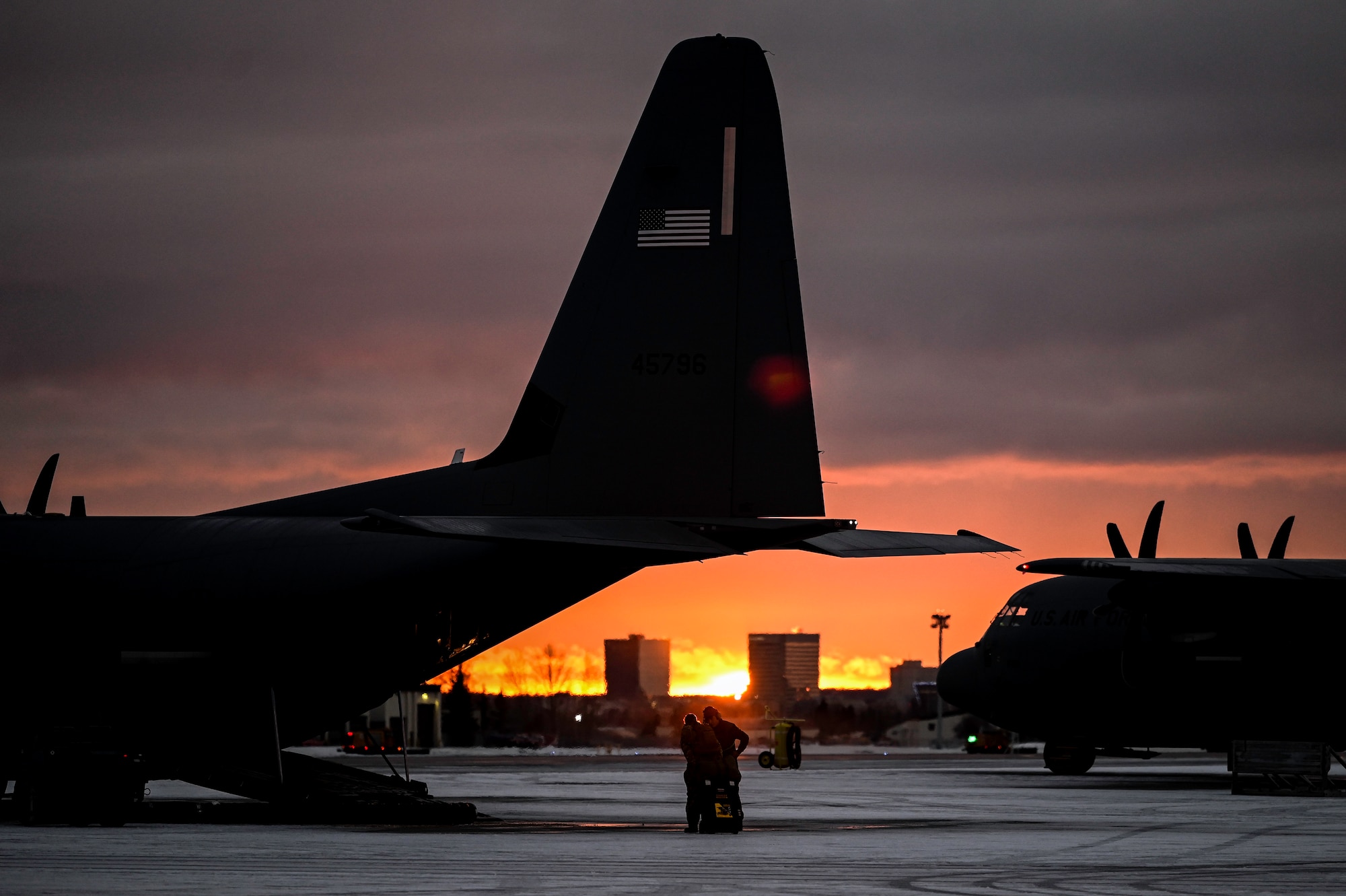 A C-130J Super Hercules aircraft, assigned to the 61st Airlift Squadron, sits on the flightline prior to a Joint Forcible Entry (JFE) to kick off Joint Pacific Multinational Readiness Center 25-02, at Joint Base Elmendorf-Richardson, Alaska, Jan. 22, 2025. The 19th Airlift Wing operates the largest C-130 fleet in the world, providing unmatched tactical airlift capabilities.