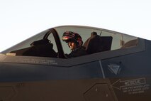 A photo of a pilot in the cockpit