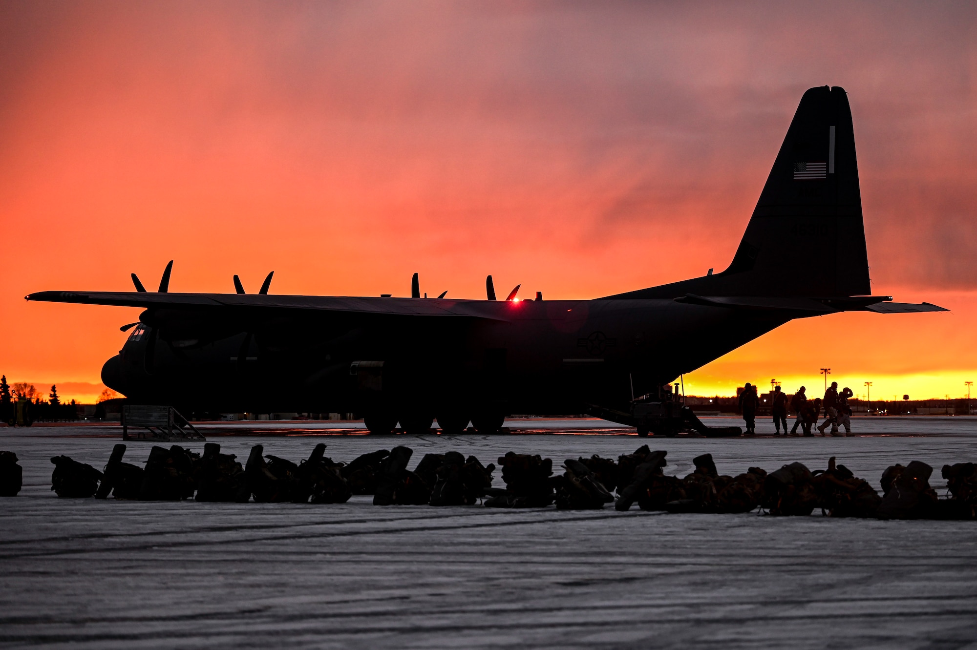 A C-130J Super Hercules aircraft, assigned to the 61st Airlift Squadron, sits on the flightline prior to a Joint Forcible Entry (JFE) to kick off Joint Pacific Multinational Readiness Center 25-02 at Joint Base Elmendorf-Richardson, Alaska, Jan. 22, 2025. The 19th Airlift Wing operates the largest C-130 fleet in the world, providing unmatched tactical airlift capabilities.