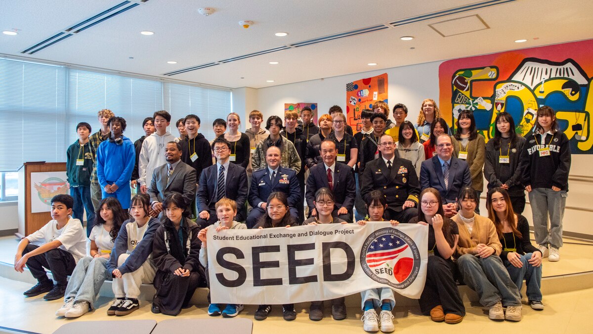 Participants and local leadership pose for a photo after completing a Student Educational Exchange and Dialogue (SEED) project at Misawa Air Base, Japan, Feb. 2, 2025.