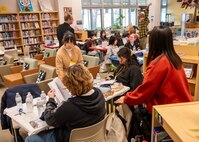 Students from Edgren Middle-High School and local Japanese high schools interact after finishing their group projects during a Student Educational Exchange and Dialogue (SEED) project at Misawa Air Base, Japan, Feb. 2, 2025.