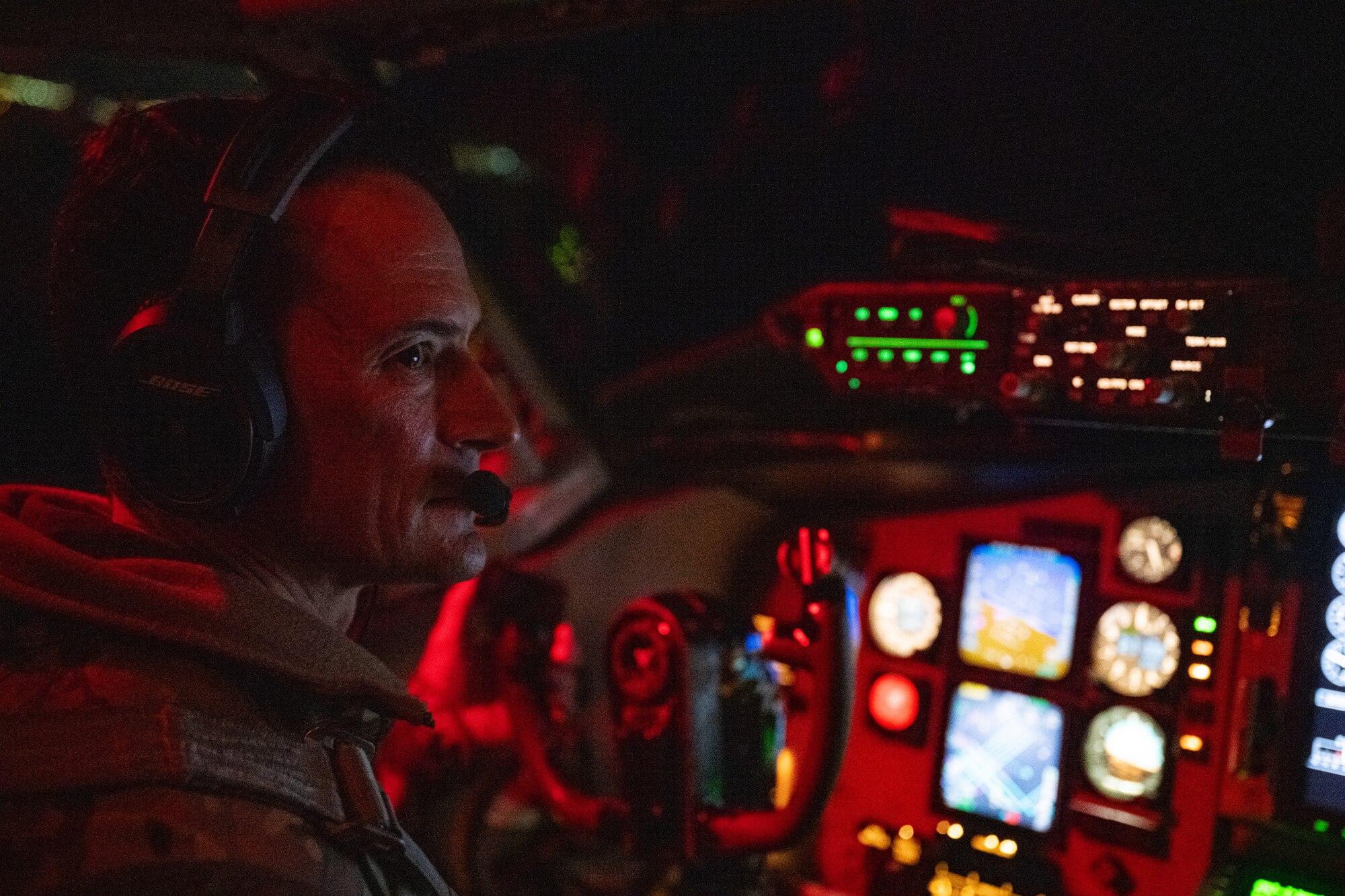 U.S. Air Force Maj. Gen. Paul Moga, left, Third Air Force commander, and Capt. Katleen Ybarra, 351st Air Refueling Squadron pilot, fly a KC-135 Stratotanker over England, Jan. 30, 2025. Moga received an orientation flight onboard a KC-135 Stratotanker to see the aerial refueling mission firsthand. (U.S. Air Force photo by Senior Airman Christopher Campbell)