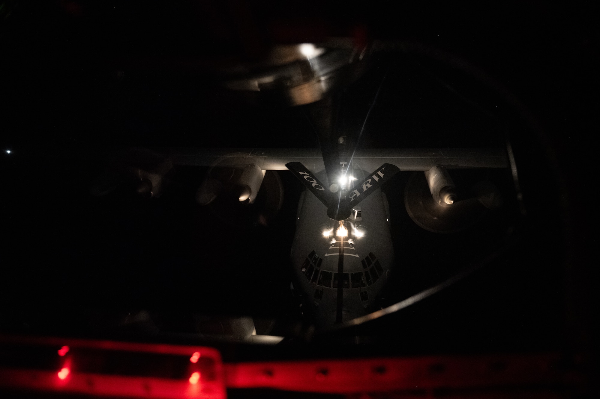 A U.S. Air Force MC-130J Commando II from the 352d Special Operations Wing, RAF  Mildenhall, England, receives fuel from a KC-135 Stratotanker from the 100th Air Refueling Wing, RAF Mildenhall, England, during aerial refueling operations over England, Jan. 30, 2025. The KC-135s are a force multiplier that extend the reach of fighter, bomber, reconnaissance and cargo aircraft. (U.S. Air Force photo by Senior Airman Christopher Campbell)