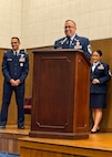 Air Force Master Sgt. Aaron Widner, center, smiles as he speaks during his retirement ceremony in 2024, marking the end of his 25-year military career at Joint Base Andrews, Maryland. Widner recently transitioned into civil service as a data scientist with U.S. Army Medical Logistics Command.