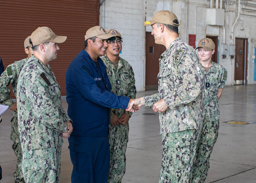 GUANTANAMO BAY, Cuba (February 5, 2025) U.S. Naval Forces Southern Command/U.S. 4th Fleet Commander Rear Adm. Carlos Sardiello meets with Sailors attached to Freedom-variant Littoral Combat Ship USS Saint Louis (LCS 19) aboard the ship during their support of Operation Southern Guard at Naval Station Guantanamo Bay, Cuba, February 5, 2025. At the direction of the President of the United States to the Department of Homeland Security (DHS) and the Department of Defense, U.S. military service members are supporting removal operations led by DHS at Naval Station Guantanamo Bay. (U.S. Navy photo by Naval Station Guantanamo Bay Public Affairs)