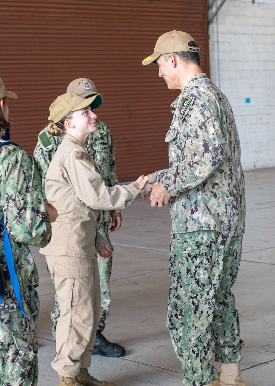 GUANTANAMO BAY, Cuba (February 5, 2025) U.S. Naval Forces Southern Command/U.S. 4th Fleet Commander Rear Adm. Carlos Sardiello meets with Sailors attached to Freedom-variant Littoral Combat Ship USS Saint Louis (LCS 19) aboard the ship during their support of Operation Southern Guard at Naval Station Guantanamo Bay, Cuba, February 5, 2025. At the direction of the President of the United States to the Department of Homeland Security (DHS) and the Department of Defense, U.S. military service members are supporting removal operations led by DHS at Naval Station Guantanamo Bay. (U.S. Navy photo by Naval Station Guantanamo Bay Public Affairs)