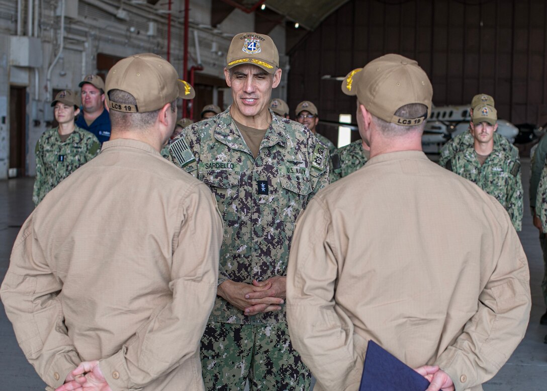 GUANTANAMO BAY, Cuba (February 5, 2025) U.S. Naval Forces Southern Command/U.S. 4th Fleet Commander Rear Adm. Carlos Sardiello meets with Sailors attached to Freedom-variant Littoral Combat Ship USS Saint Louis (LCS 19) aboard the ship during their support of Operation Southern Guard at Naval Station Guantanamo Bay, Cuba, February 5, 2025. At the direction of the President of the United States to the Department of Homeland Security (DHS) and the Department of Defense, U.S. military service members are supporting removal operations led by DHS at Naval Station Guantanamo Bay. (U.S. Navy photo by Naval Station Guantanamo Bay Public Affairs)