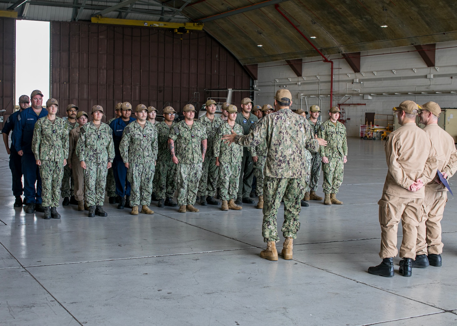 GUANTANAMO BAY, Cuba (February 5, 2025) U.S. Naval Forces Southern Command/U.S. 4th Fleet Commander Rear Adm. Carlos Sardiello meets with Sailors attached to Freedom-variant Littoral Combat Ship USS Saint Louis (LCS 19) aboard the ship during their support of Operation Southern Guard at Naval Station Guantanamo Bay, Cuba, February 5, 2025. At the direction of the President of the United States to the Department of Homeland Security (DHS) and the Department of Defense, U.S. military service members are supporting removal operations led by DHS at Naval Station Guantanamo Bay. (U.S. Navy photo by Naval Station Guantanamo Bay Public Affairs)