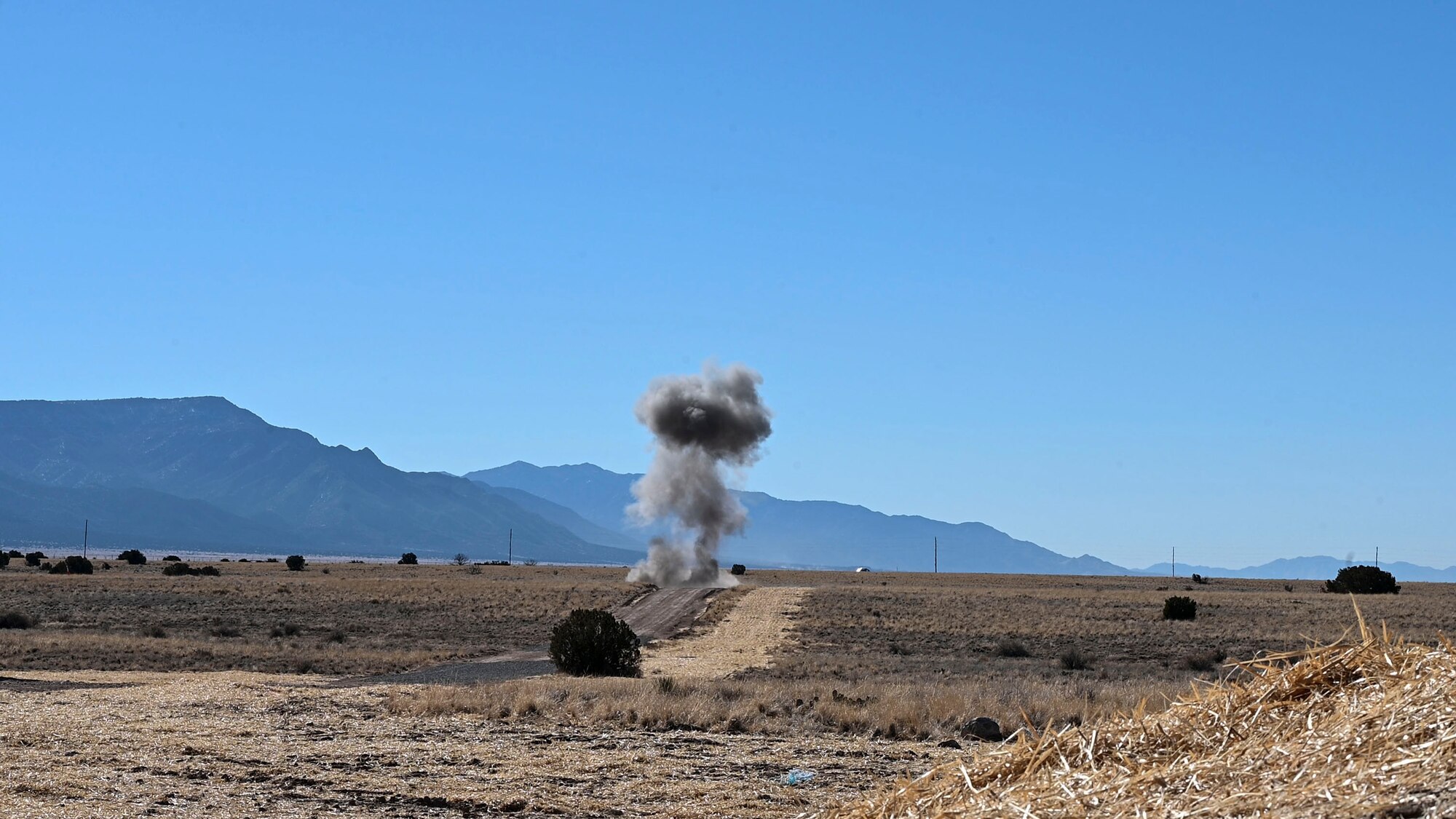 A cloud of smoke plumes.