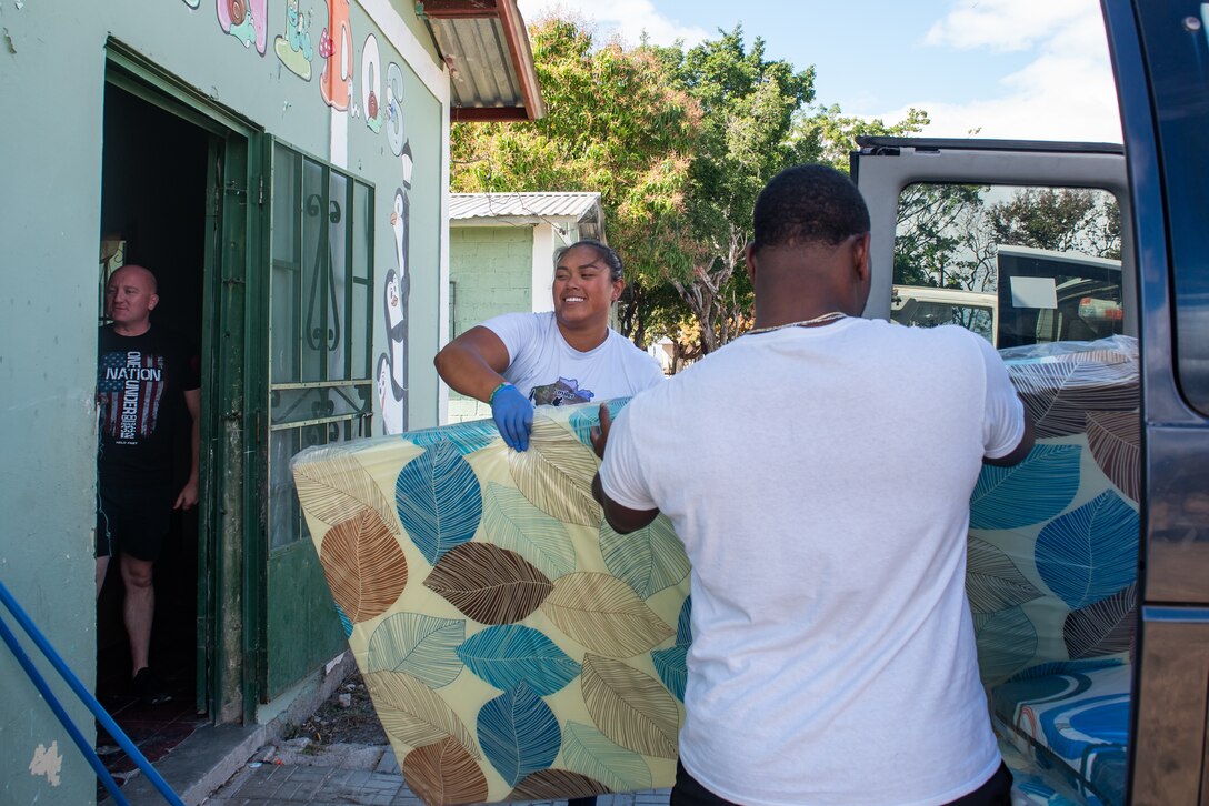Joint Task Force-Bravo members unload mattresses out of a van at San Antonio de Padua orphanage in Comayagua, Honduras, January 27, 2025.