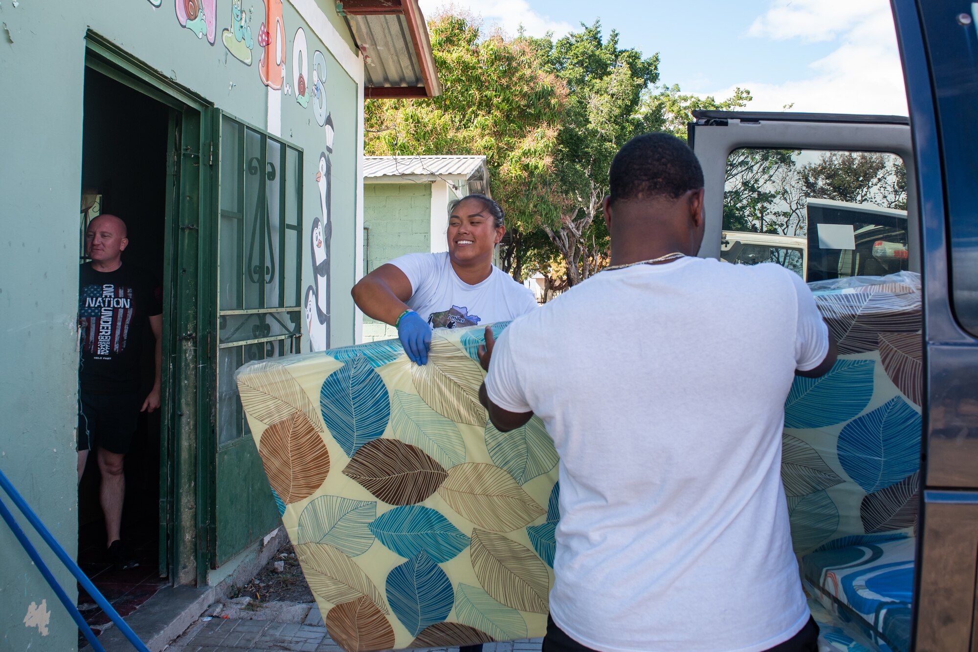 Joint Task Force-Bravo members unload mattresses out of a van at San Antonio de Padua orphanage in Comayagua, Honduras, January 27, 2025.