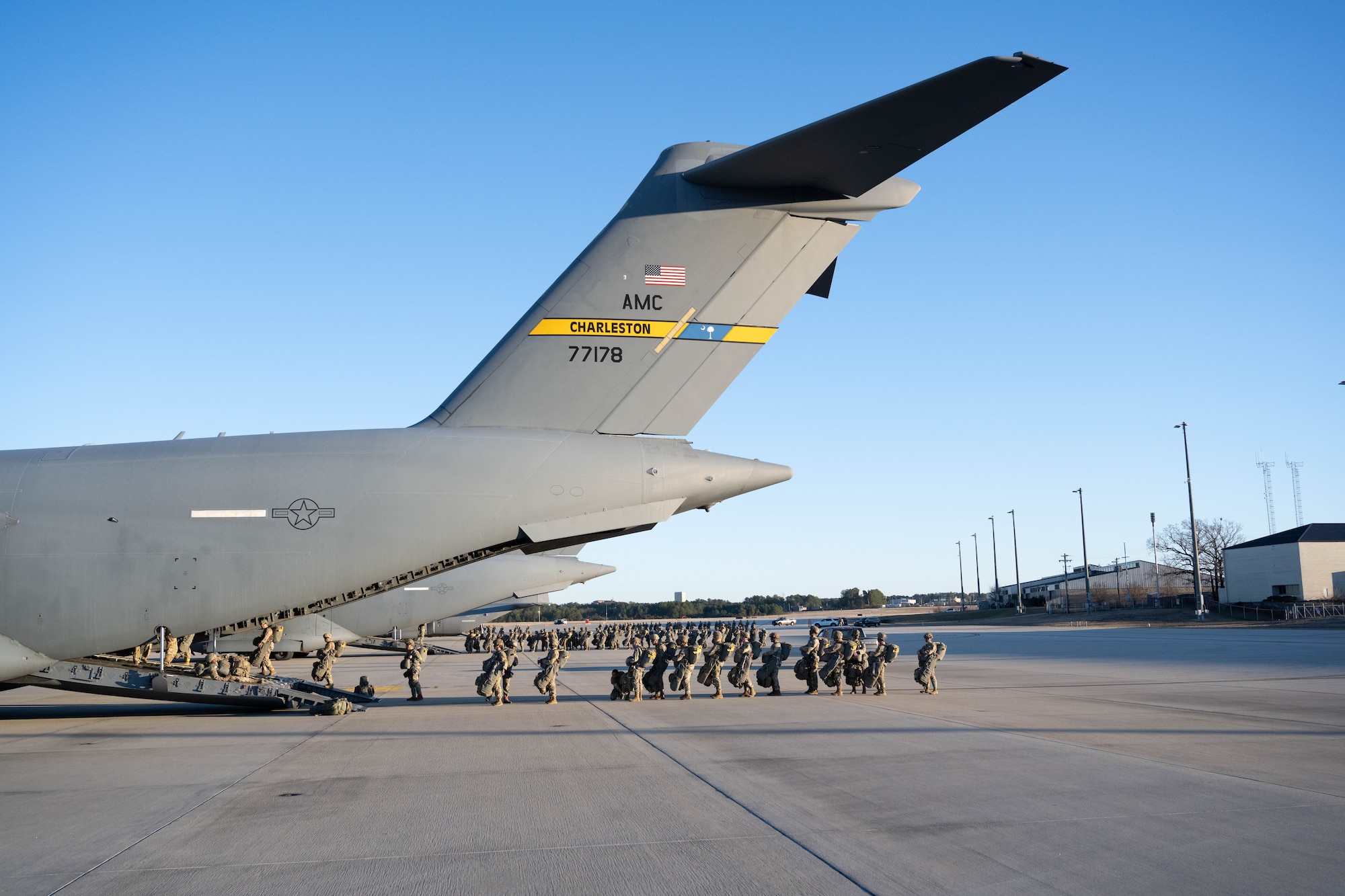 U.S Soldiers load onto an aircraft.