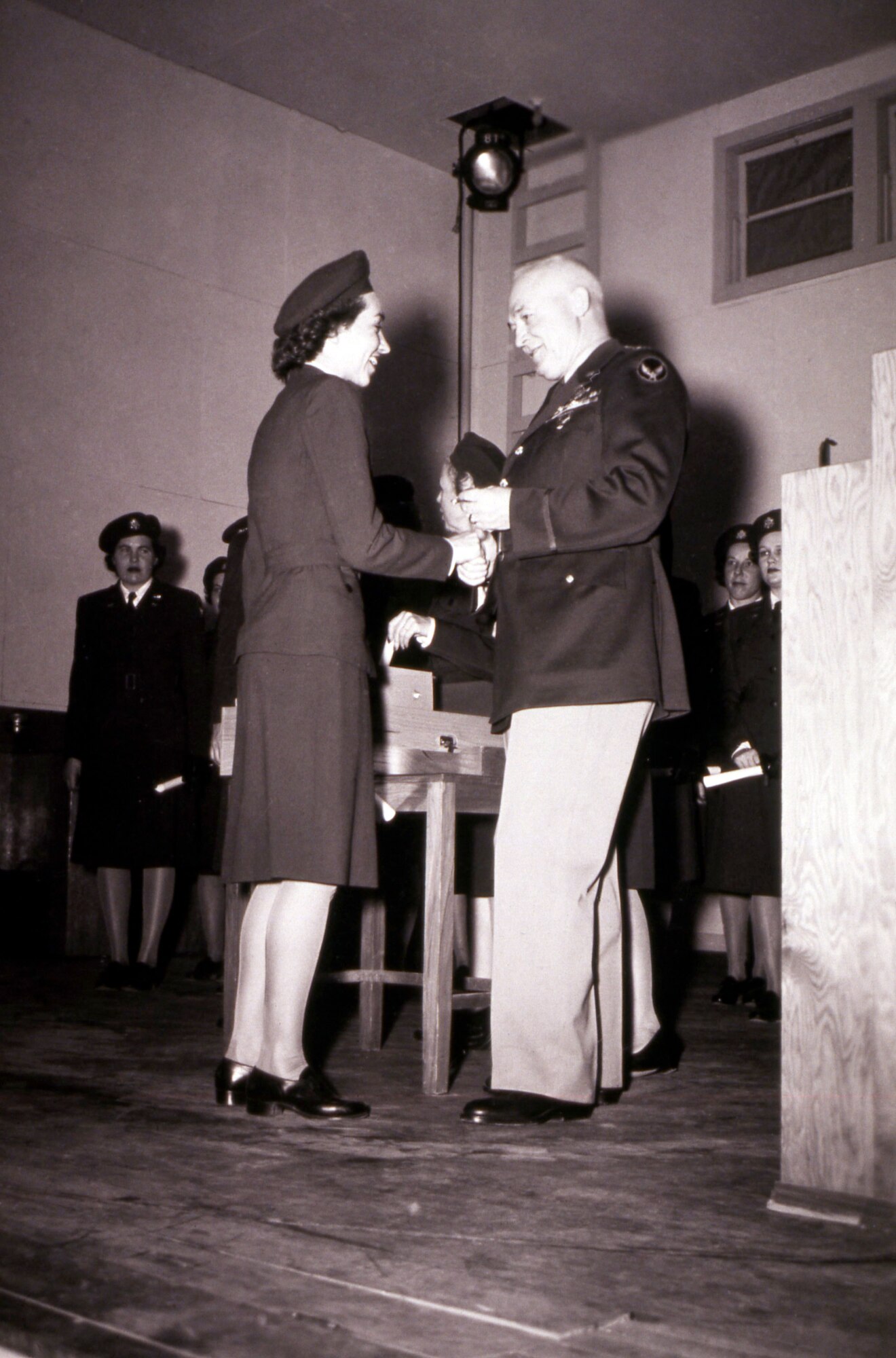 General H. H. Arnold awarding a diploma to a WASP
